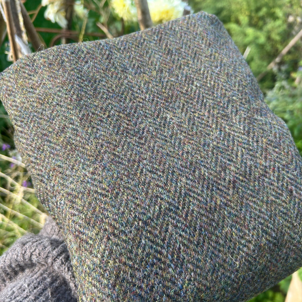Close-up of a textured fabric with a blurred natural background